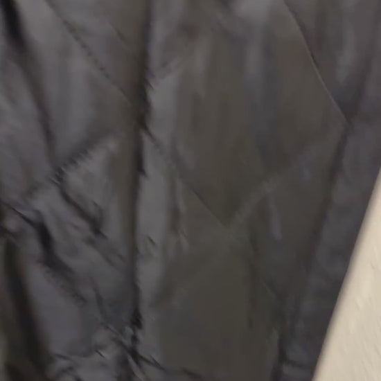 Customer video: Fillis thermal insulated door curtain on a 36 x 82 door, magnetic seam closing behind her